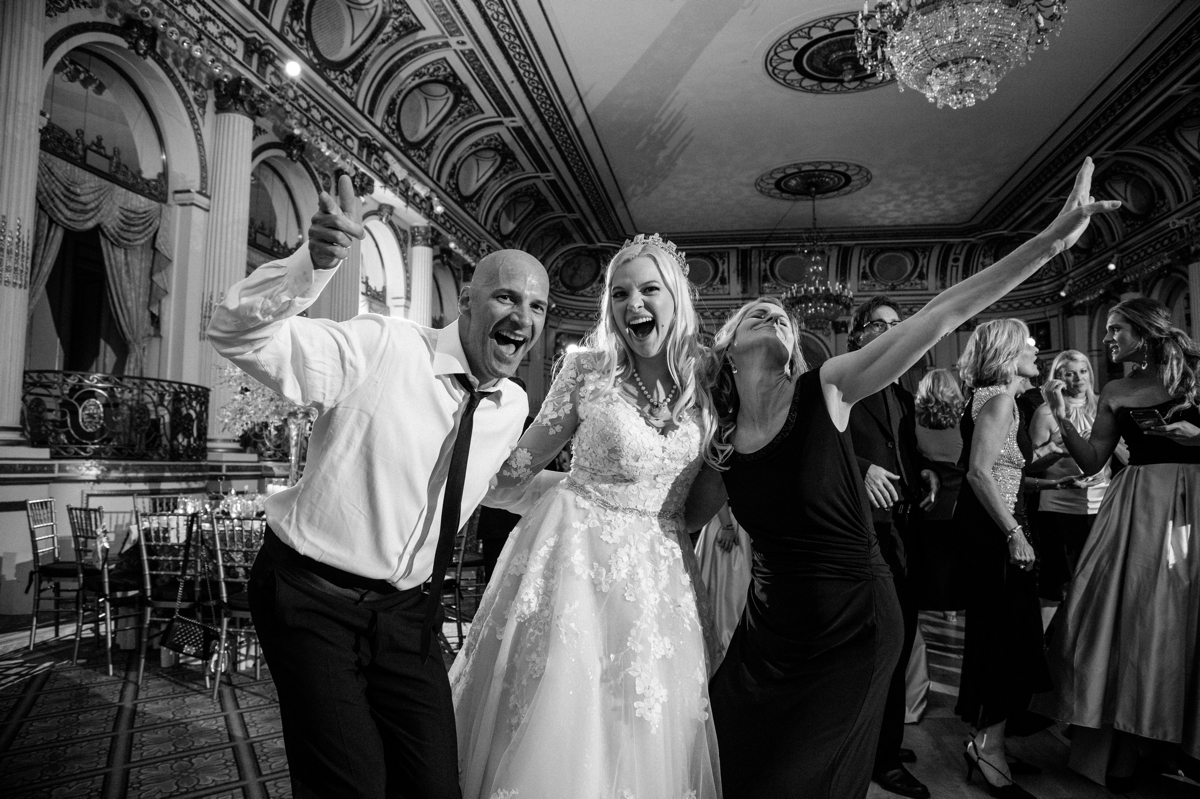 Plaza Hotel Wedding NYC Luxury Royal Wedding Bride and Groom Laughter Candid Crown Grand Ballroom Cute Fun Happy Black and White Silly