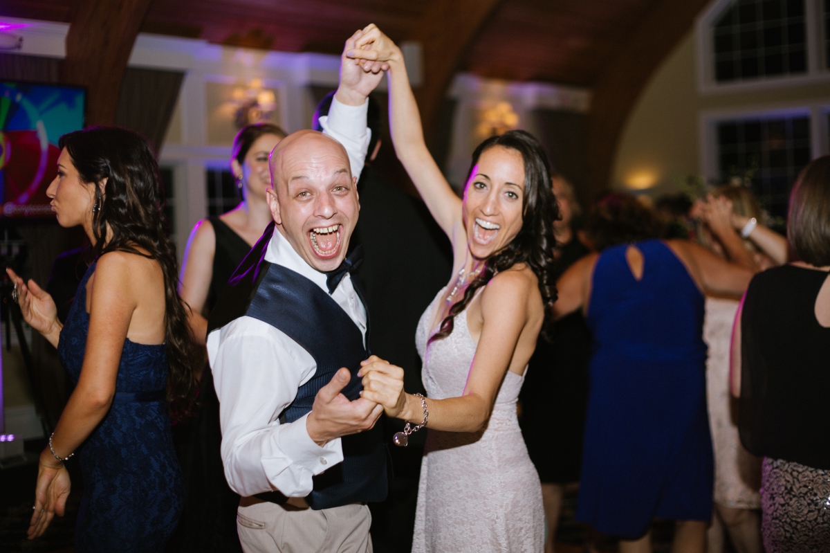 long beach island wedding lbi bonnet island estate jersey shore merrimaker caterers happy bride and groom candid happy dancing reception funny candid
