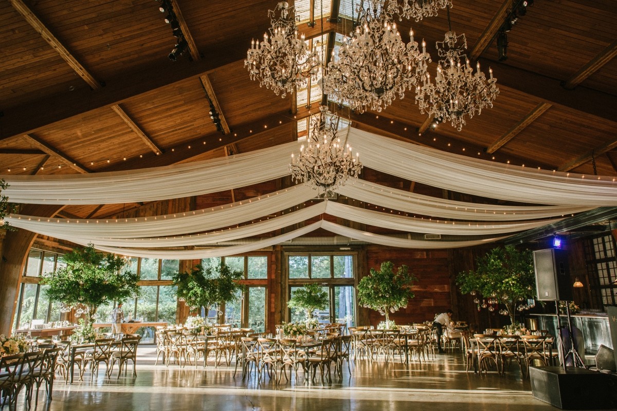 Cedar Lakes Estate Summer Wedding Port Jervis NY Camp Inspired Wood Forest Trees Greenery Just married Golf Cart happy love golden light bright lake details faye and renee flowers florals rustic barn table setting centerpiece drapes