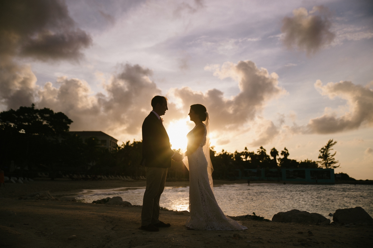 Jamaican Destination Wedding Island Resort sunshine portraits palm trees beach sunset bride and groom silhouette