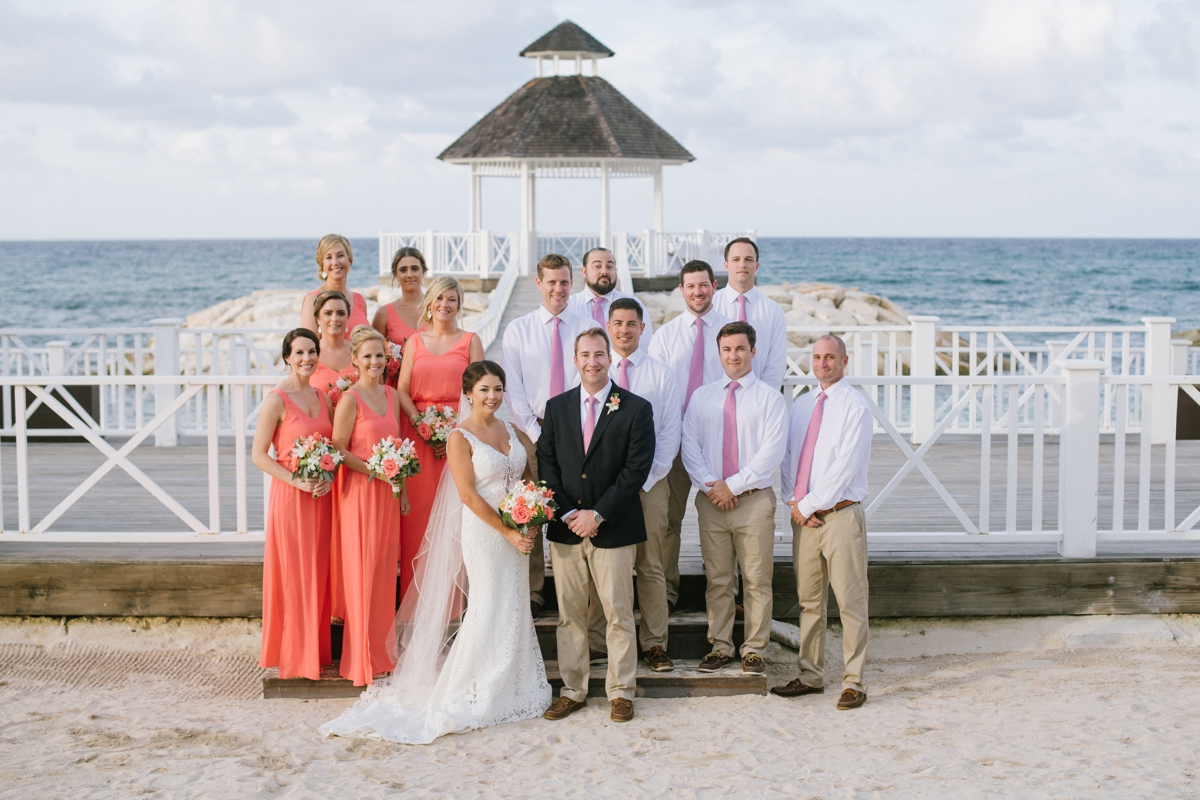 Jamaican Destination Wedding Island Resort sunshine portraits palm trees beach Caribbean bride and groom scenic bridal party