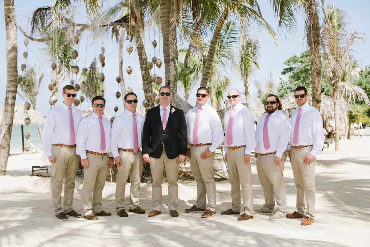 Jamaican Destination Wedding Island Resort sunshine groom and groomsmen portraits palm trees sunglasses beach