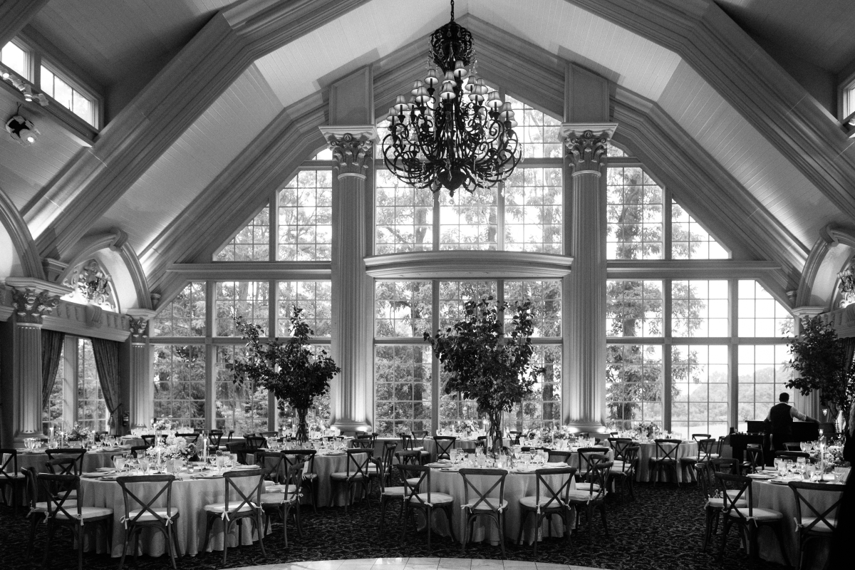 Black and white interior reception room chandelier Grand Elegant Classic Garden Theme Weddings of Distinction Merrimaker Caterers Ashford Estate Summer Wedding by Gilded Lilly Events