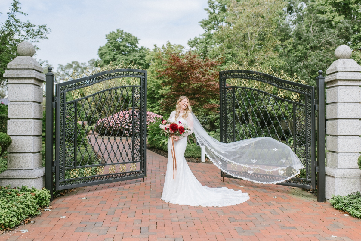 bride bridal veil toss laughter happy Ashford Estate Fall Wedding faye and renee florals flowers fountain elegant classic clean and modern estate mansion
