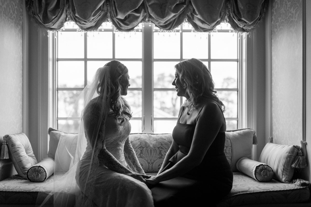 black and white window candid moment bride and mom Ashford Estate Fall Wedding faye and renee florals flowers fountain elegant classic clean and modern estate mansion