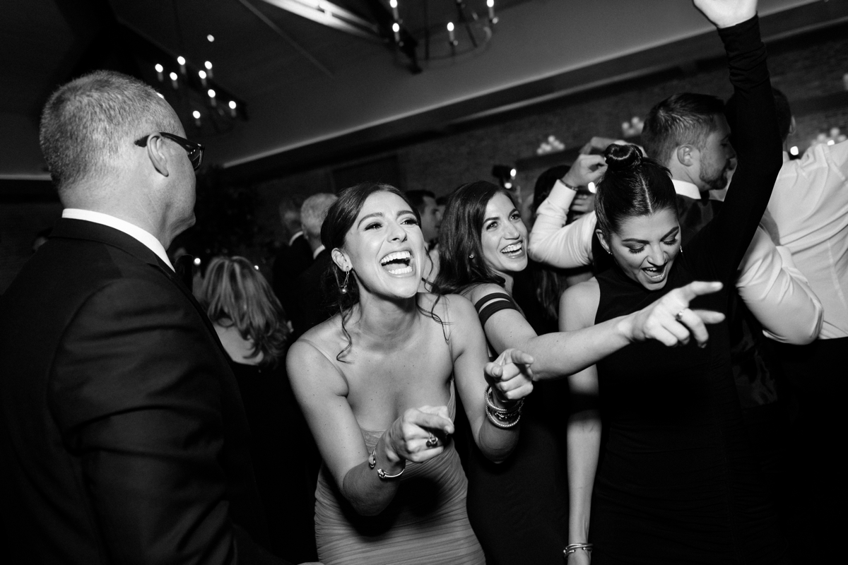 happy guests dance floor reception candid black and white Natirar 90 acres Mansion wedding peapack NJ new jersey lush greenery 
