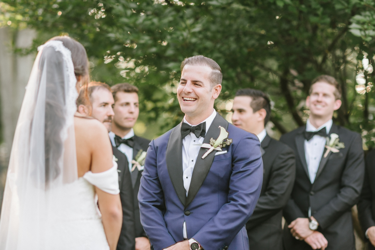 groom natural candid happy laughing invitations TPC Jasna Polana Golf Course Wedding beautiful elegant timeless new jersey wedding photography