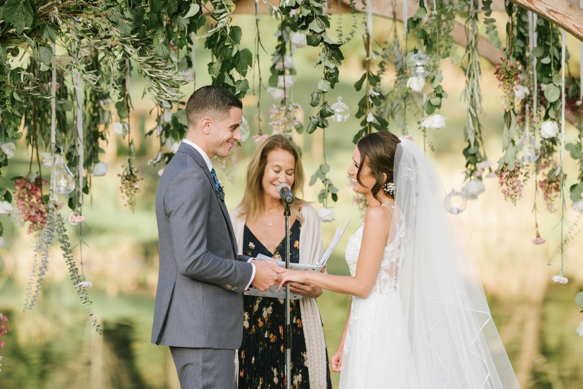 laughing candid happy bride and groom outdoor ceremony Bear Brook Valley Wedding