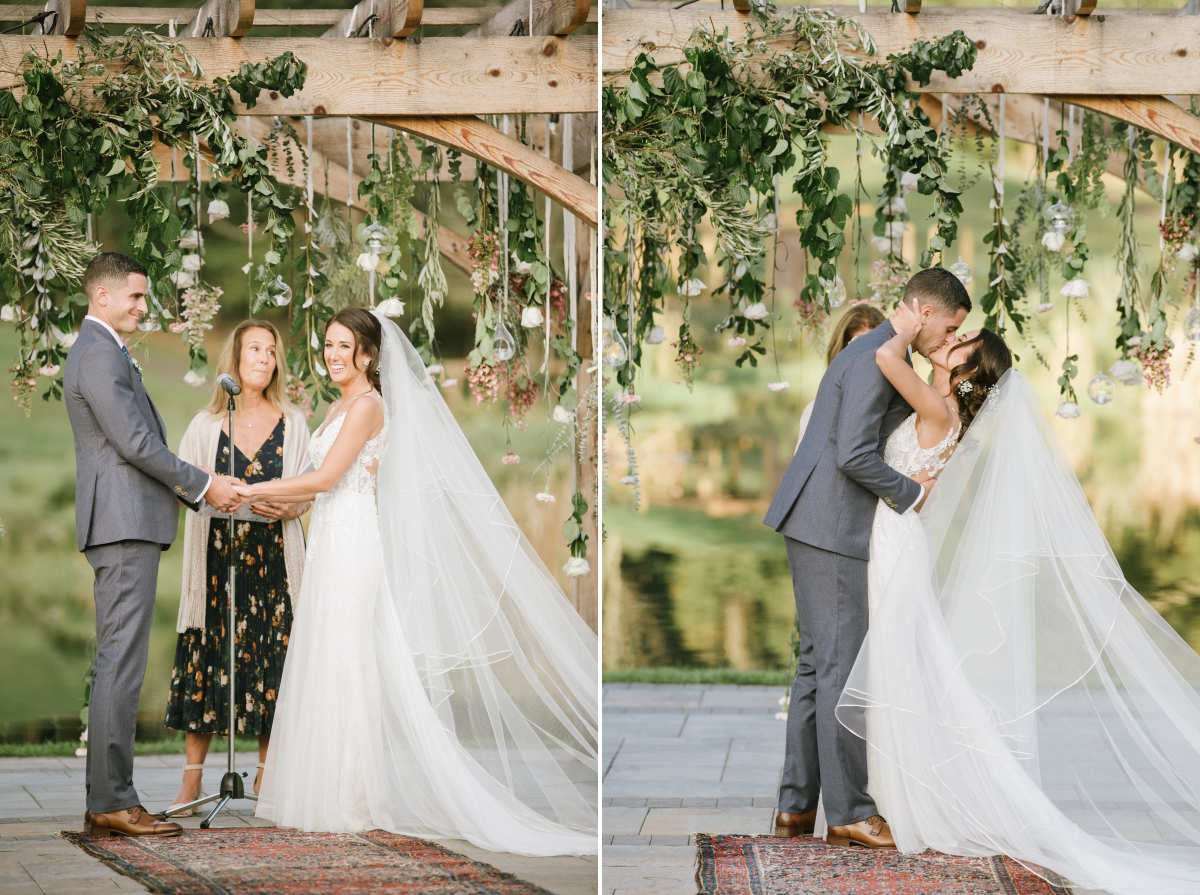 first kiss husband and wife rustic trellis outdoor ceremony kiss just married Bear Brook Valley Wedding
