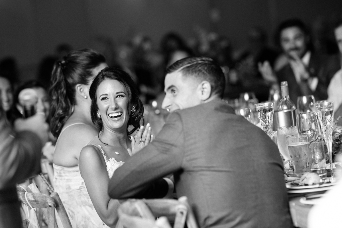 black and white candid speeches bride and groom reaction laughing Bear Brook Valley Wedding