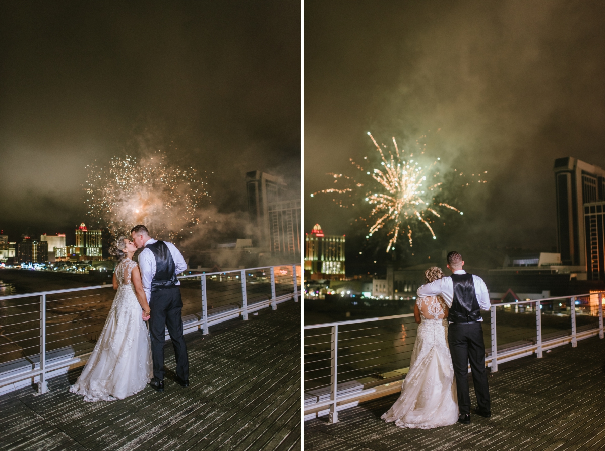 love fireworks kissing night time bride and groom beach One Atlantic Wedding Atlantic City New Jersey