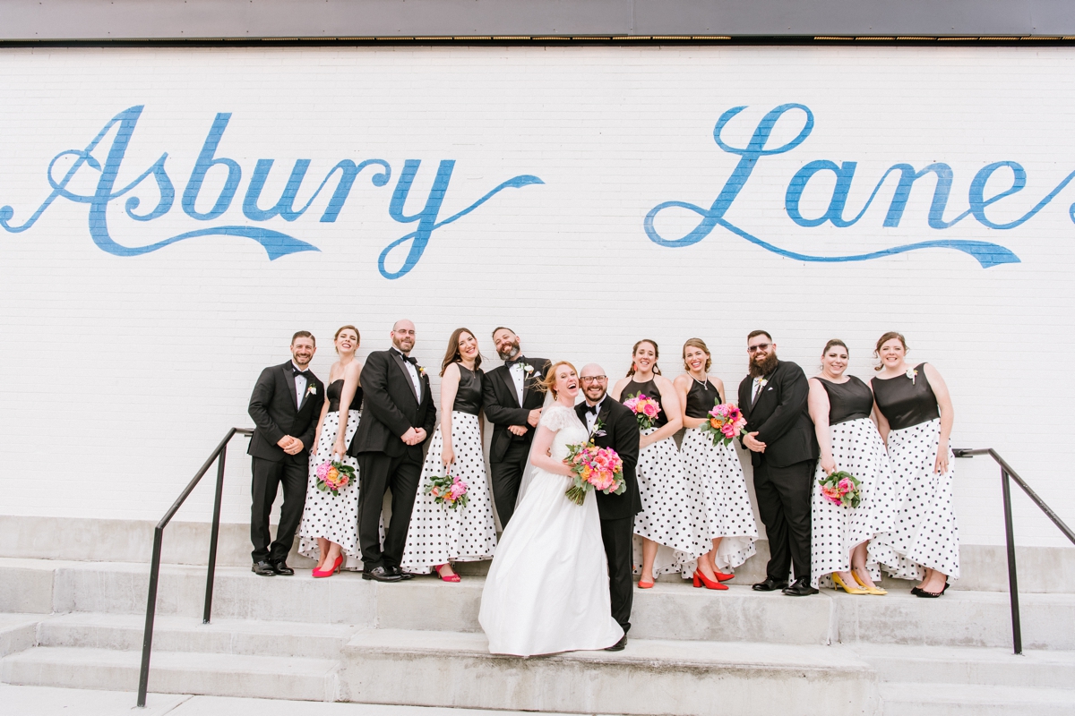 Fun and Playful Asbury Park Wedding at the Berkeley Oceanfront Hotel Bridal Party Mural Pose
