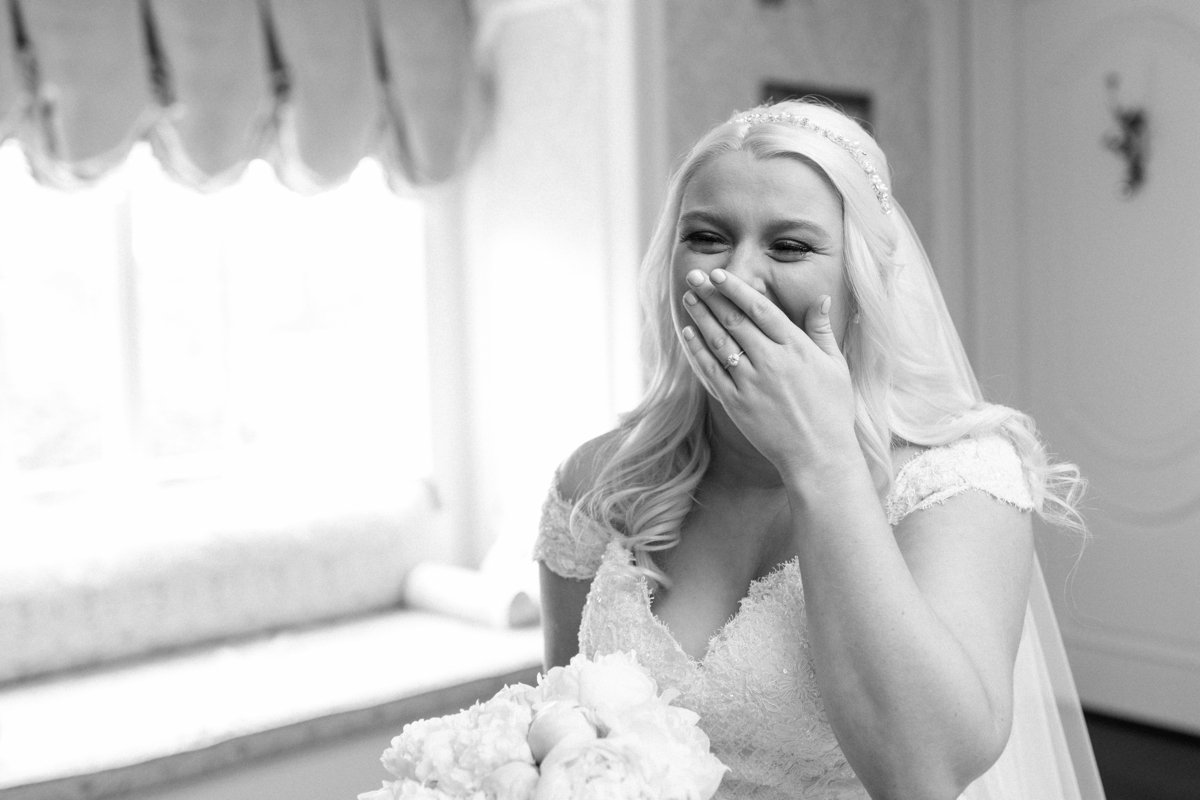 Bride laughing at the Ashford estate
