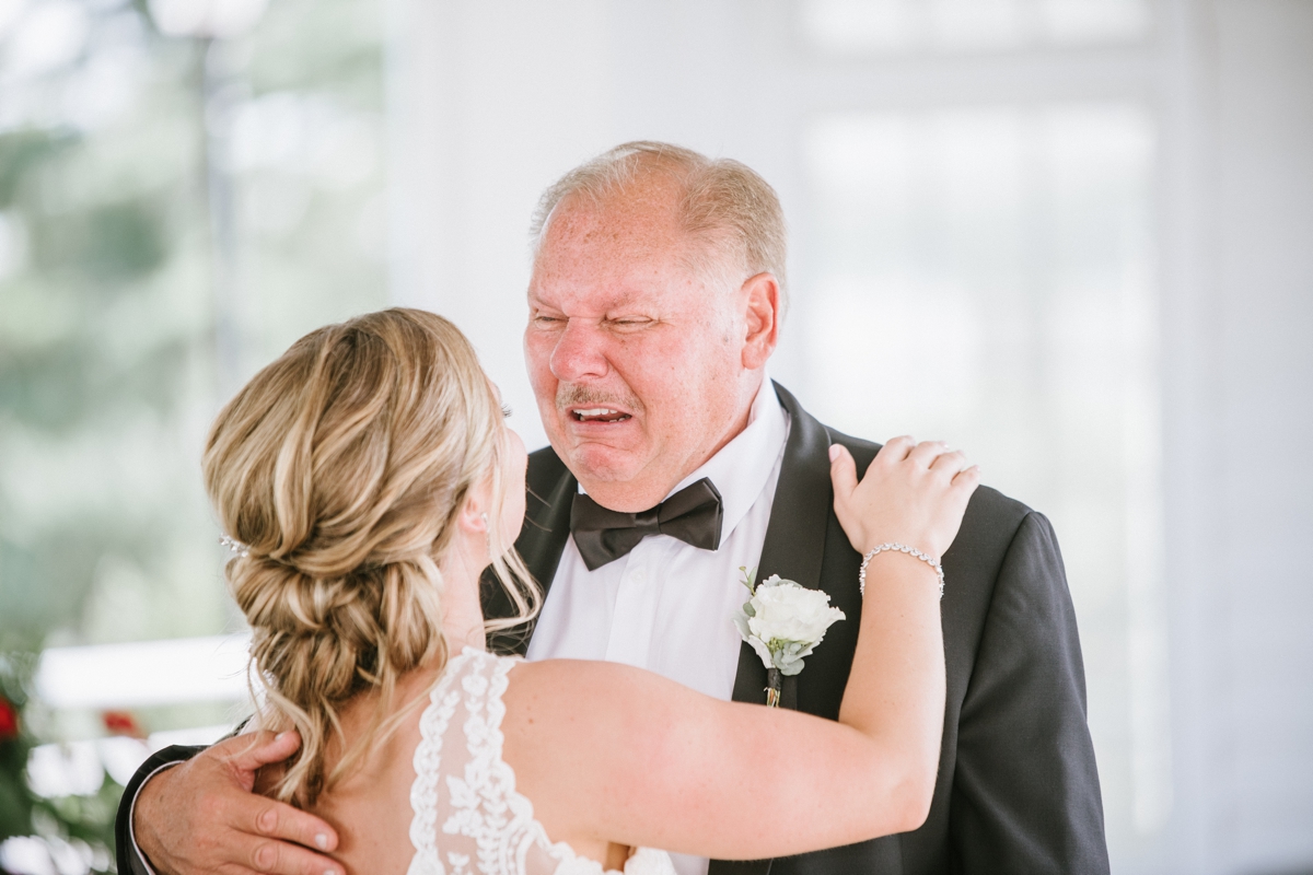 A perfect summer wedding at the Ryland Inn bride first look with dad