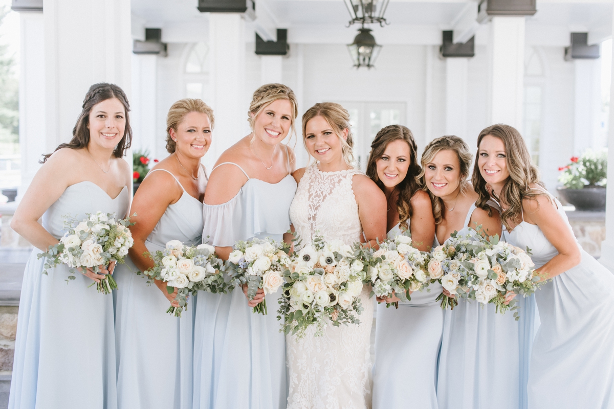 A perfect summer wedding at the Ryland Inn bridesmaids with flowers