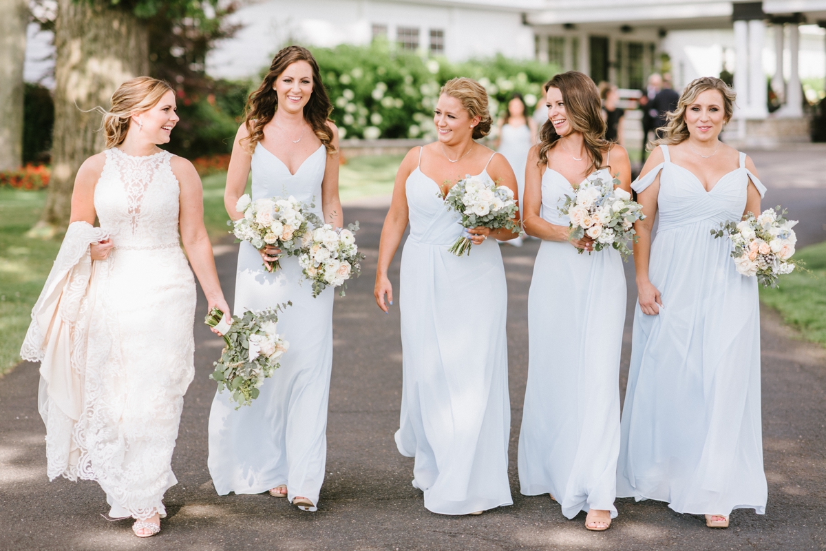 A perfect summer wedding at the Ryland Inn bridesmaids walking