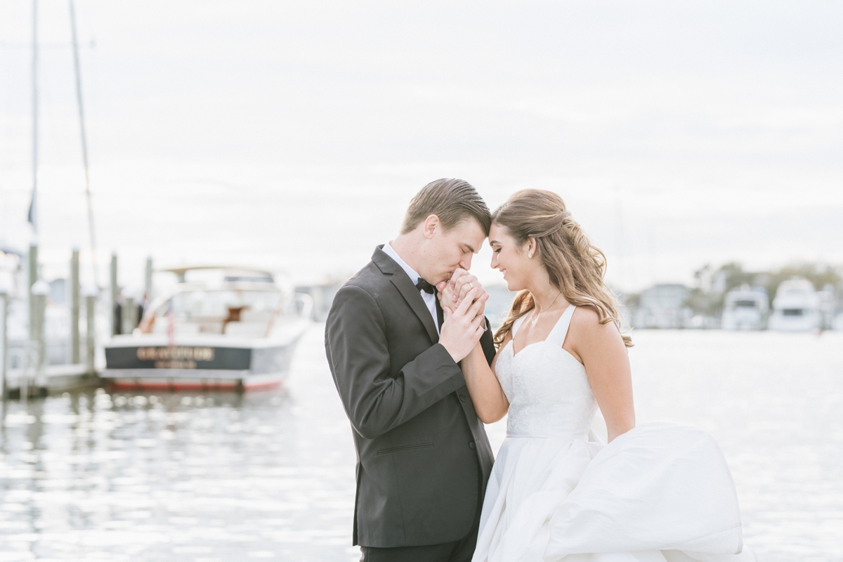 Coastal Bay Head Yacht Club fall wedding bride and groom kiss
