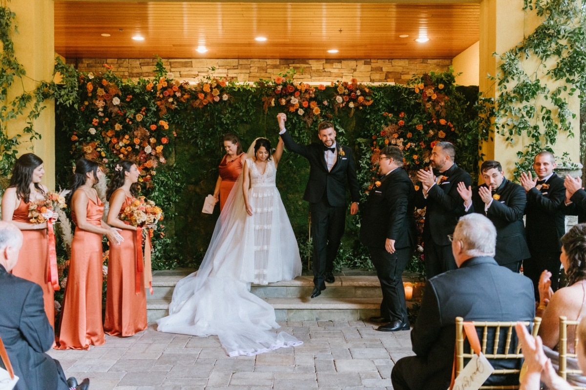 The-Stone-House-Bride-and-Groom-Ending-their-Autumn-Themed-Ceremony