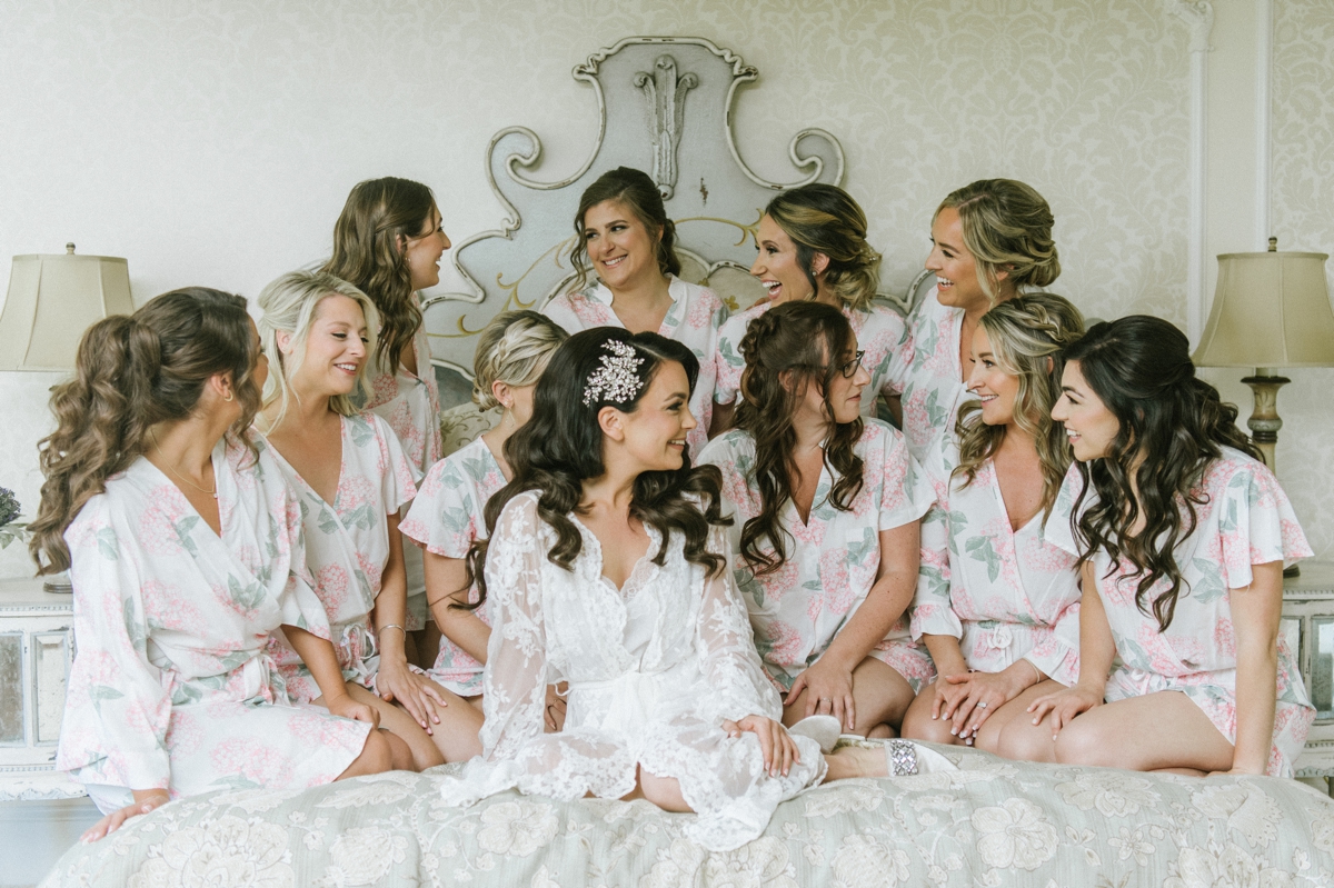Weddings-of-distinction-Ashford-Estate-summer-wedding-bridesmaids-in-matching-pjs
