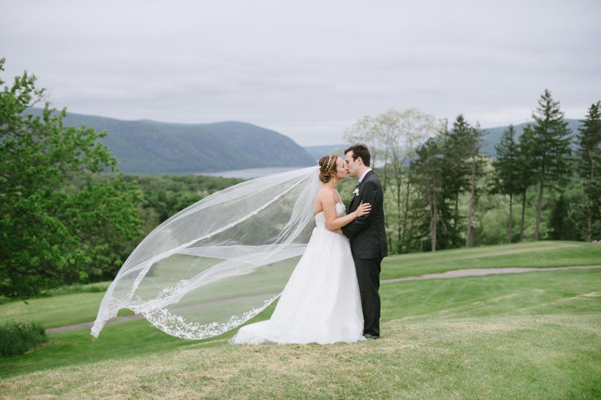 The Garrison NY Wedding Upstate NY NJ Rustic Details first look bride and groom portraits greenery trees rustic bride and groom veil toss mountain top