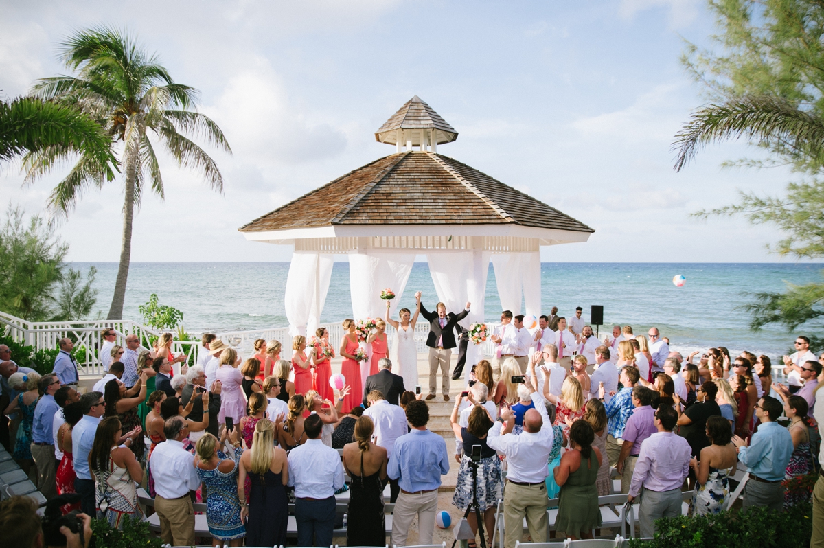 Jamaican Destination Wedding Island Resort sunshine portraits palm trees beach bride groom bridal ceremony candid moments