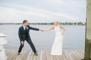 Oyster Point Hotel NJ Wedding Red Bank Nautical Dusty Rose Navy Blue Jersey Shore Classic Modern Clean bride groom candid portrait laughing dock water bay ocean silly