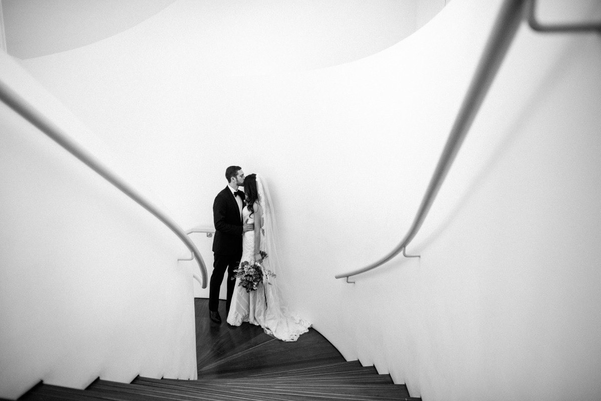 Hudson at Maritime Parc Jewish Wedding Jersey City Black and White Bride and Groom Kiss Stairwell Creative