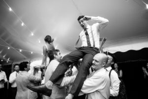 Hora Chair Lift Reactions Black and White Dancing Reception Happy Candid Rhode Island Wedding Destination Newport New England Mount Hope Farm Summer Summertime