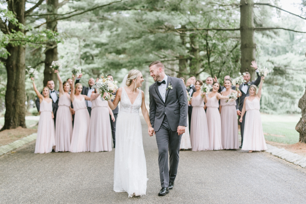 Cheer Candid Happy Bride and groom Bridal Party Neutral Natural Blushtones Saipua Bouquets Grand Elegant Classic Garden Theme Weddings of Distinction Merrimaker Caterers Ashford Estate Summer Wedding by Gilded Lilly Events