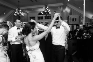 black and white bride and groom dancing reception Manasquan River Golf Club Spring Lake NJ St. Catherine's Church Timeless Classic Wedding