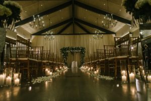 ceremony space candles greenery Natirar Mansion 90 acres wedding peapack NJ new jersey lush greenery
