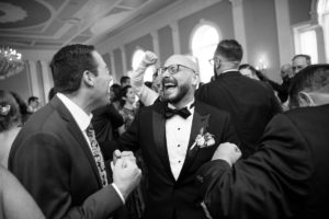 Fun and Playful Asbury Park Wedding at the Berkeley Oceanfront Hotel Groom at Reception