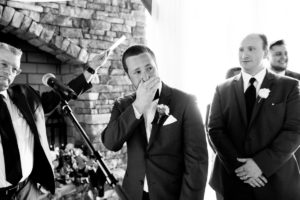 A Fun and Playful wedding at the Ryland Inn Coach House groom first look at ceremony