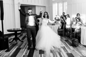 A Fun and Playful wedding at the Ryland Inn Coach House bride and groom entrance